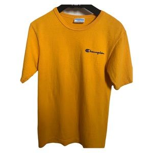 Champion: yellow t-shirt in size small.
